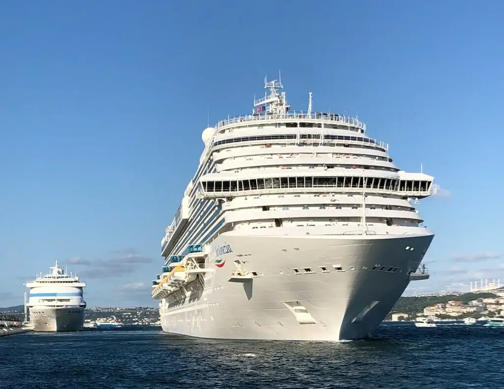 Cruise ship waiting in port for passengers to board ready to go on their next journey on the seas